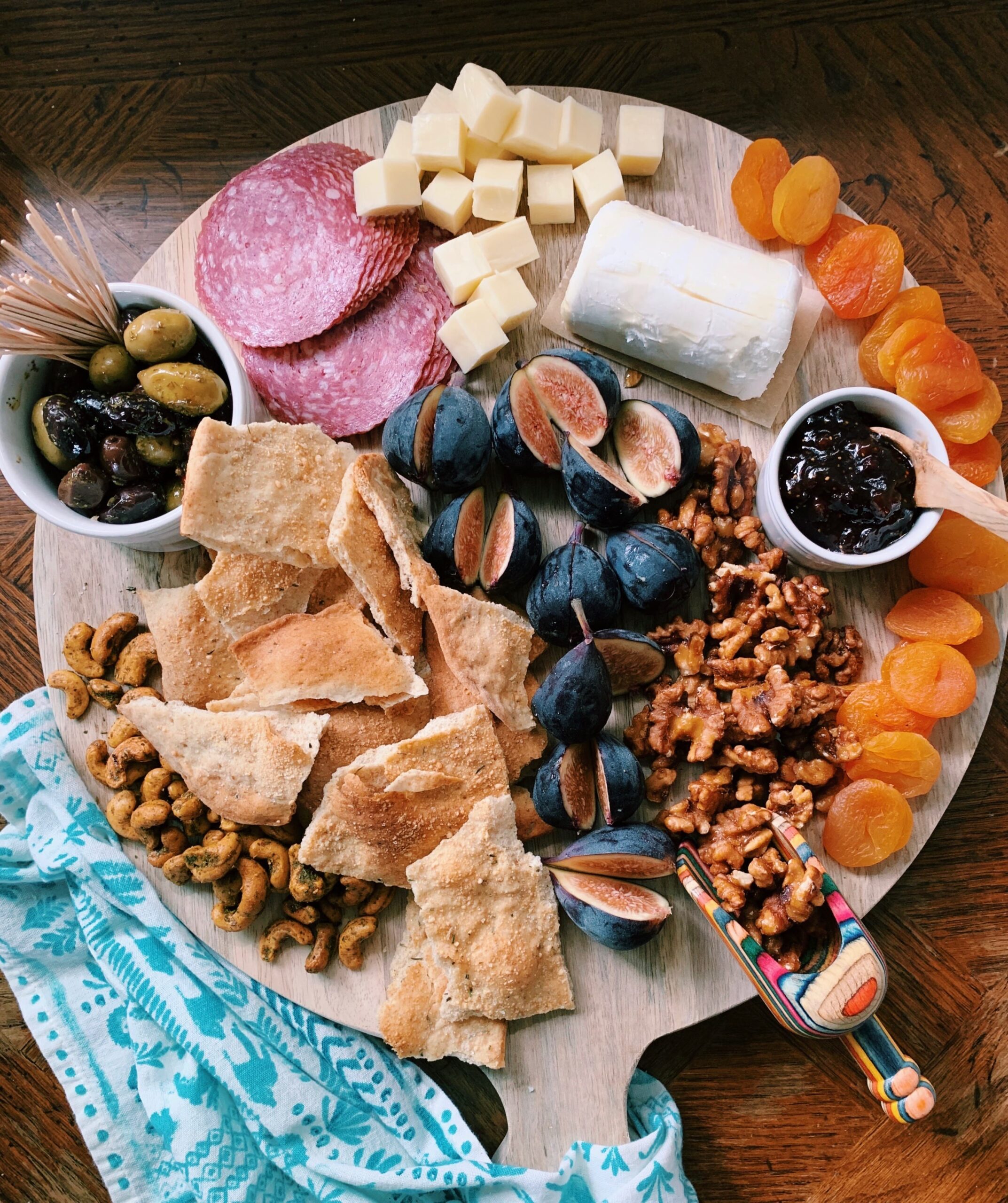 charcuterie board with homemade rosemary garlic crackers