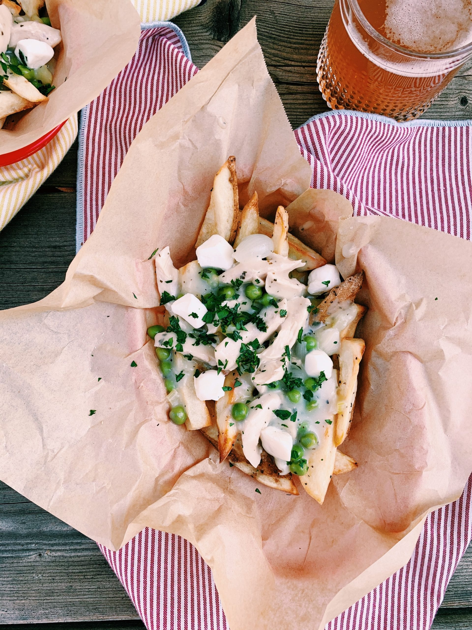 chicken pot pie poutine in a basket