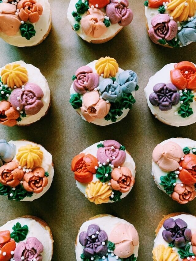 cupcakes with buttercream flowers made with russian piping tips