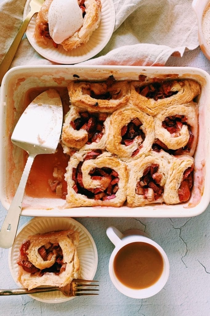 Overhead shot of strawberry rhubarb roly poly in a baking dish.