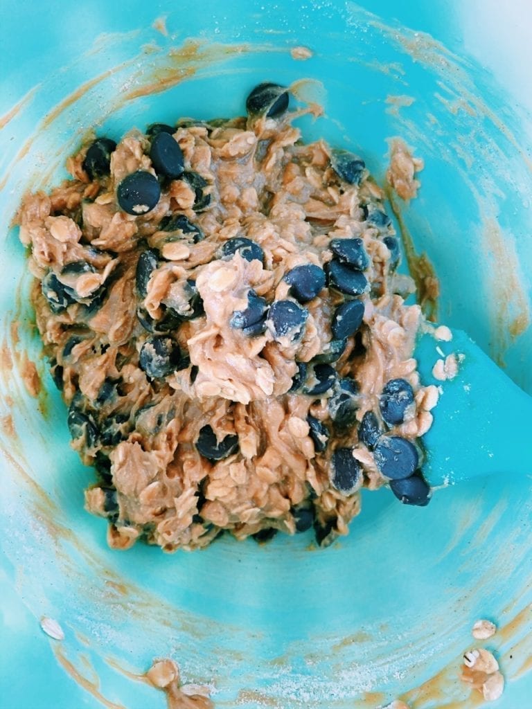 Peanut butter and honey oat cookie Dough in a blue bowl