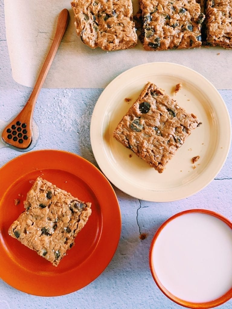 Peanut butter and honey oat cookie bars on vintage plates