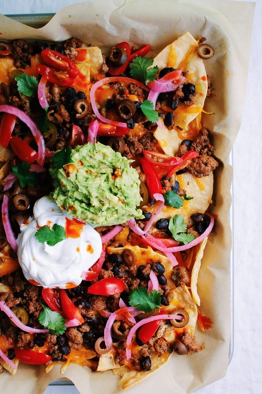 Close up of sheet pan nachos supreme