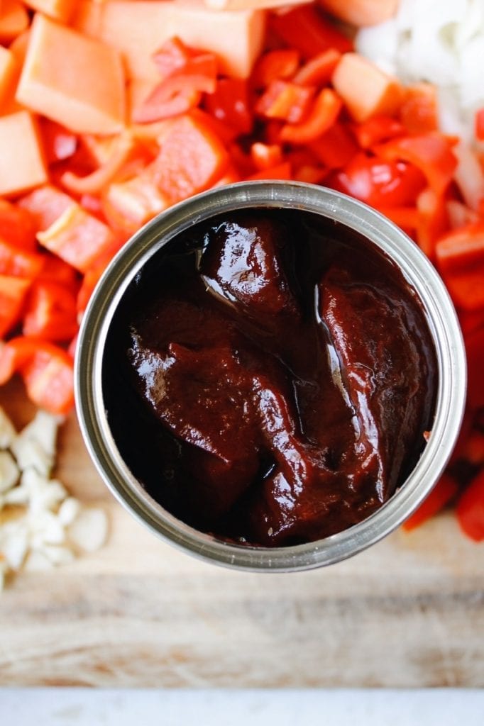Photo of open can of chipotle peppers in adobo sauce 