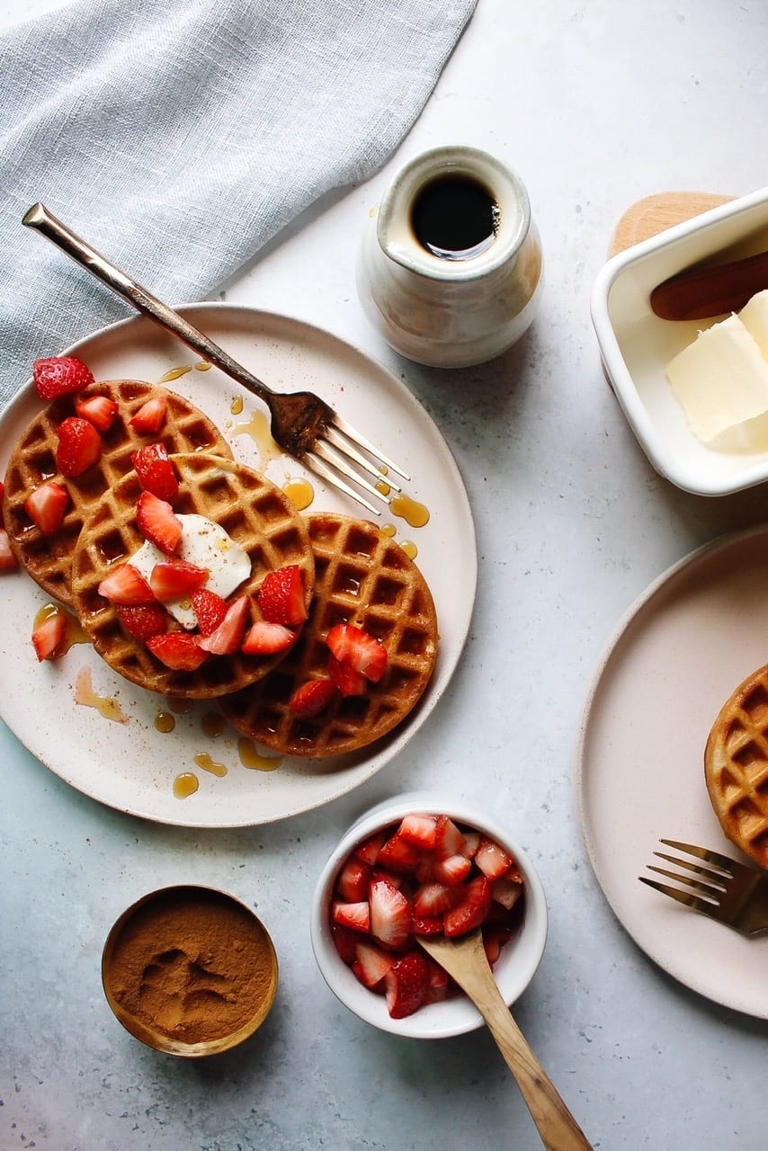 Sourdough discard waffles with strawberries and butter on top