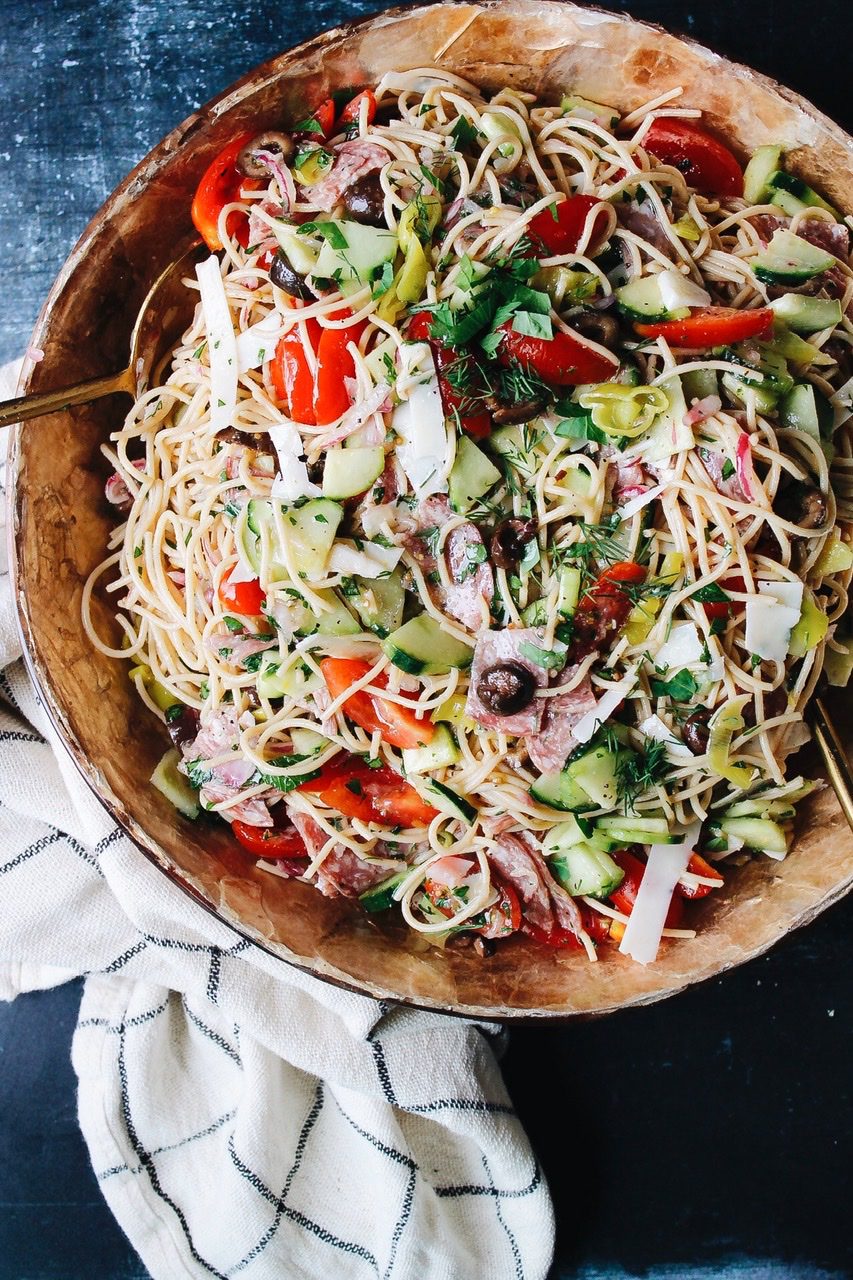 zesty italian pasta salad in a brown bowl