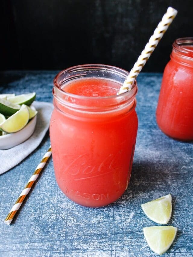 watermelon juice in a glass jar with a cute straw