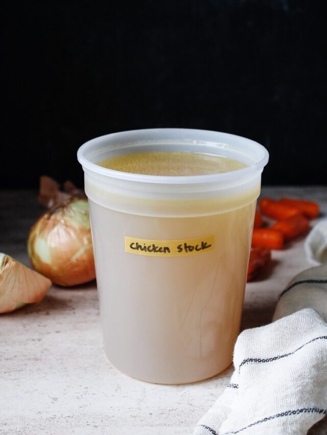 homemade chicken stock in a storage container