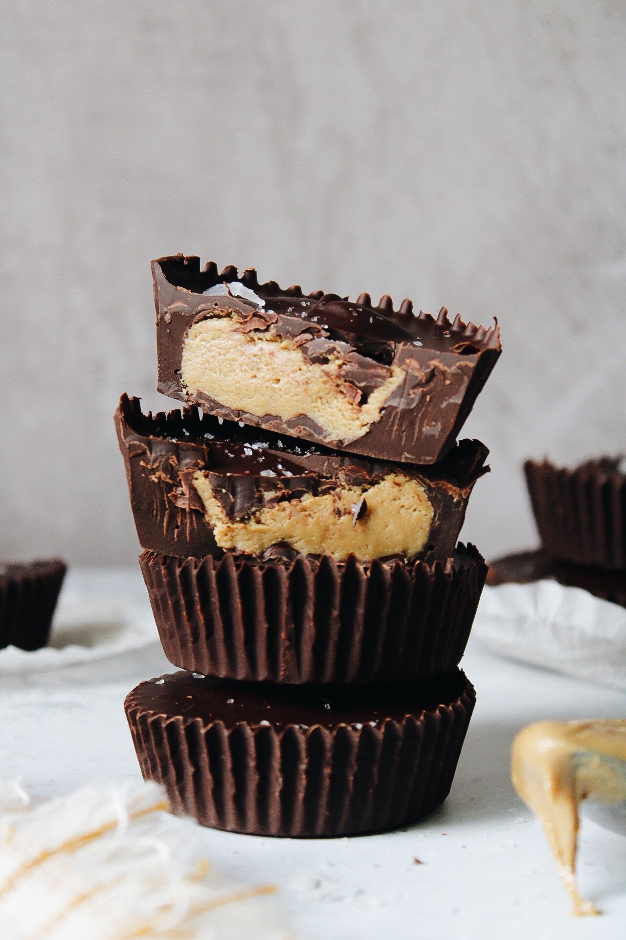 sunflower butter cups stacked with one cut in half