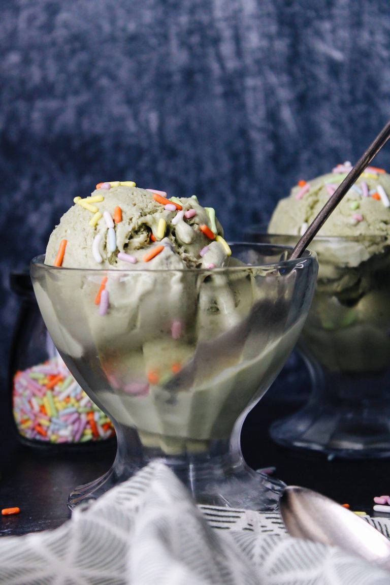 close up of matcha ice cream in glass dishes