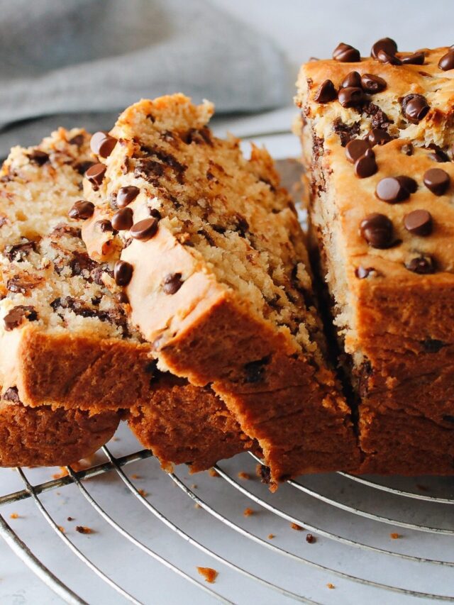 sideview of a loaf of depression era peanut butter bread slice on a cooling rack