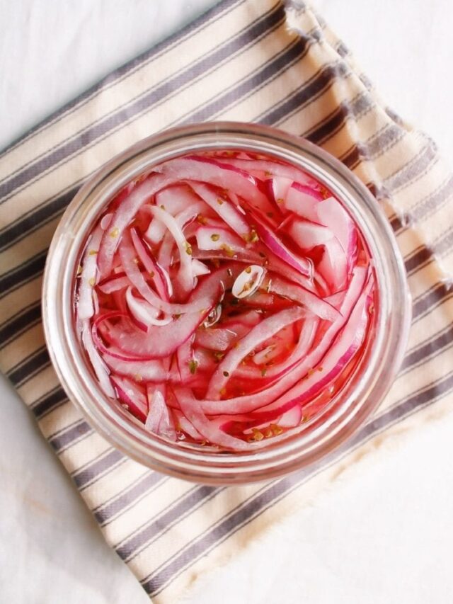 homemade pickled onions in a glass jar