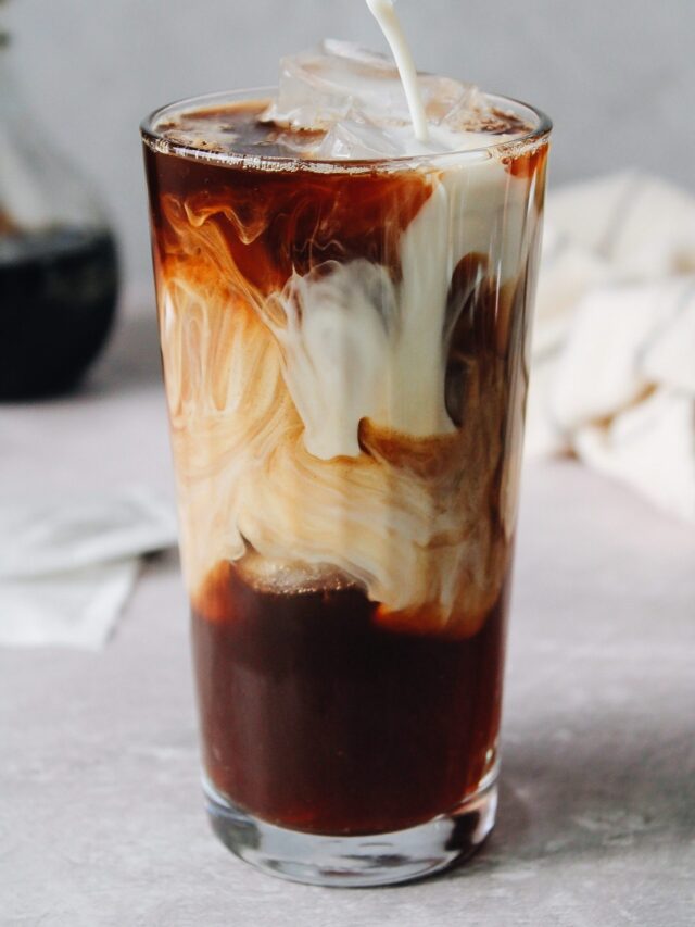 iced dirty chai in a clear glass