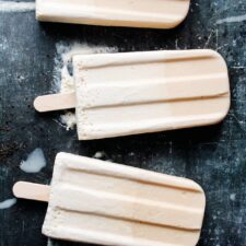 Tasty Homemade Ice Creams Pop With Sticks In Containers On Grey Stock  Photo, Picture and Royalty Free Image. Image 106122906.