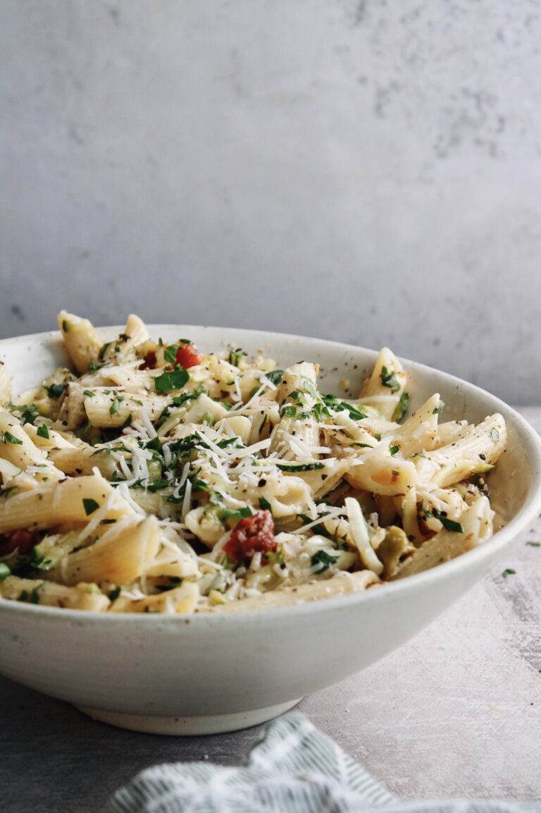 pasta salad with sun-dried tomatoes, green olives and provolone