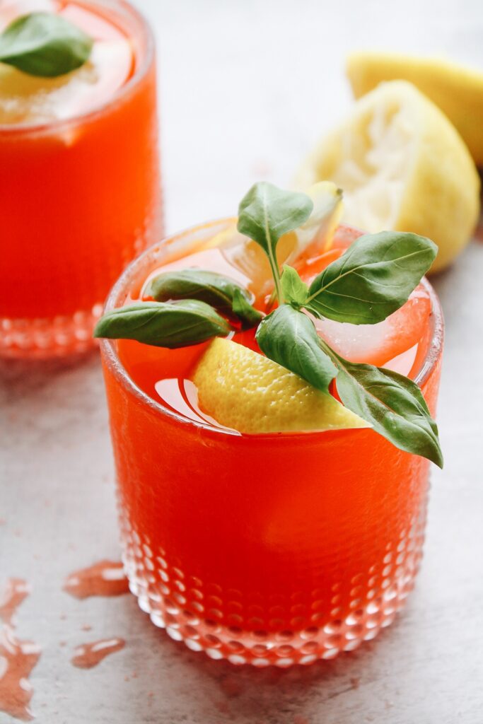 strawberry basil lemonade in a clear glass
