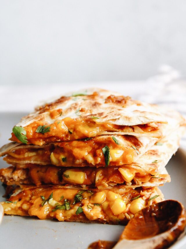 bbq chicken quesadillas stacked on a gray plate