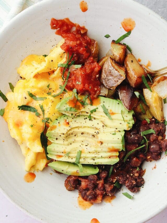 southwest breakfast bowl with black beans, potatoes, eggs, salsa and avocado