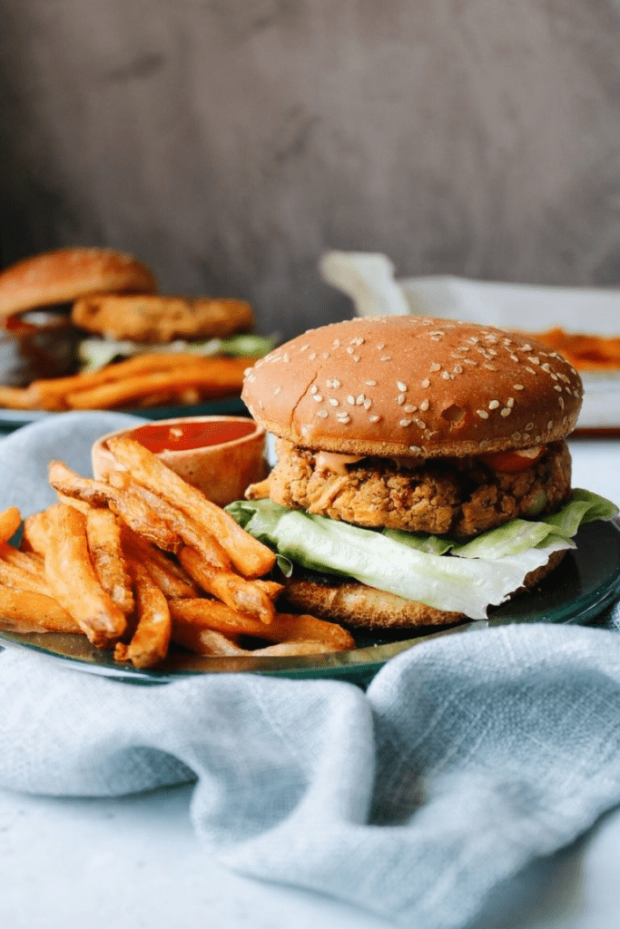 chickpea burger with sweet potato fries on a plate