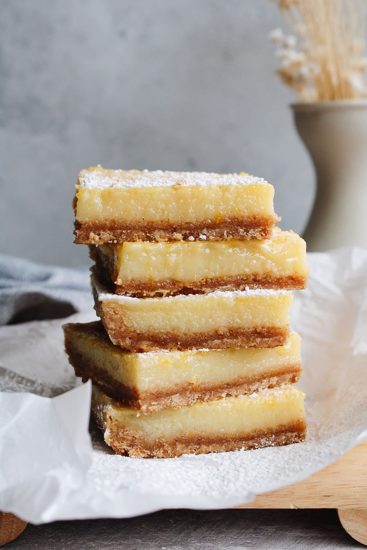 stack of lemon bars with graham cracker crust