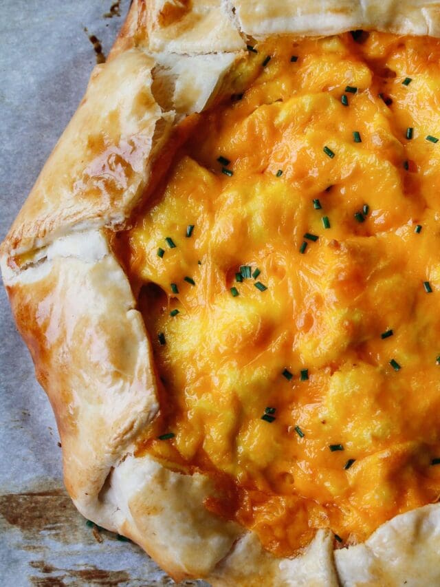 close up of breakfast galette on parchment paper