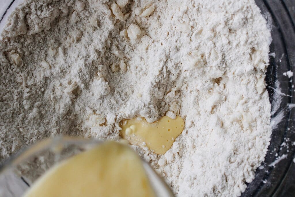 buttermilk and beaten egg added to dry ingredients for scones