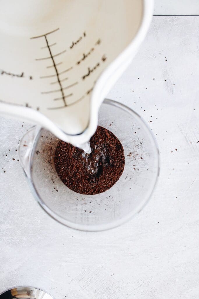 water being added to coffee grounds