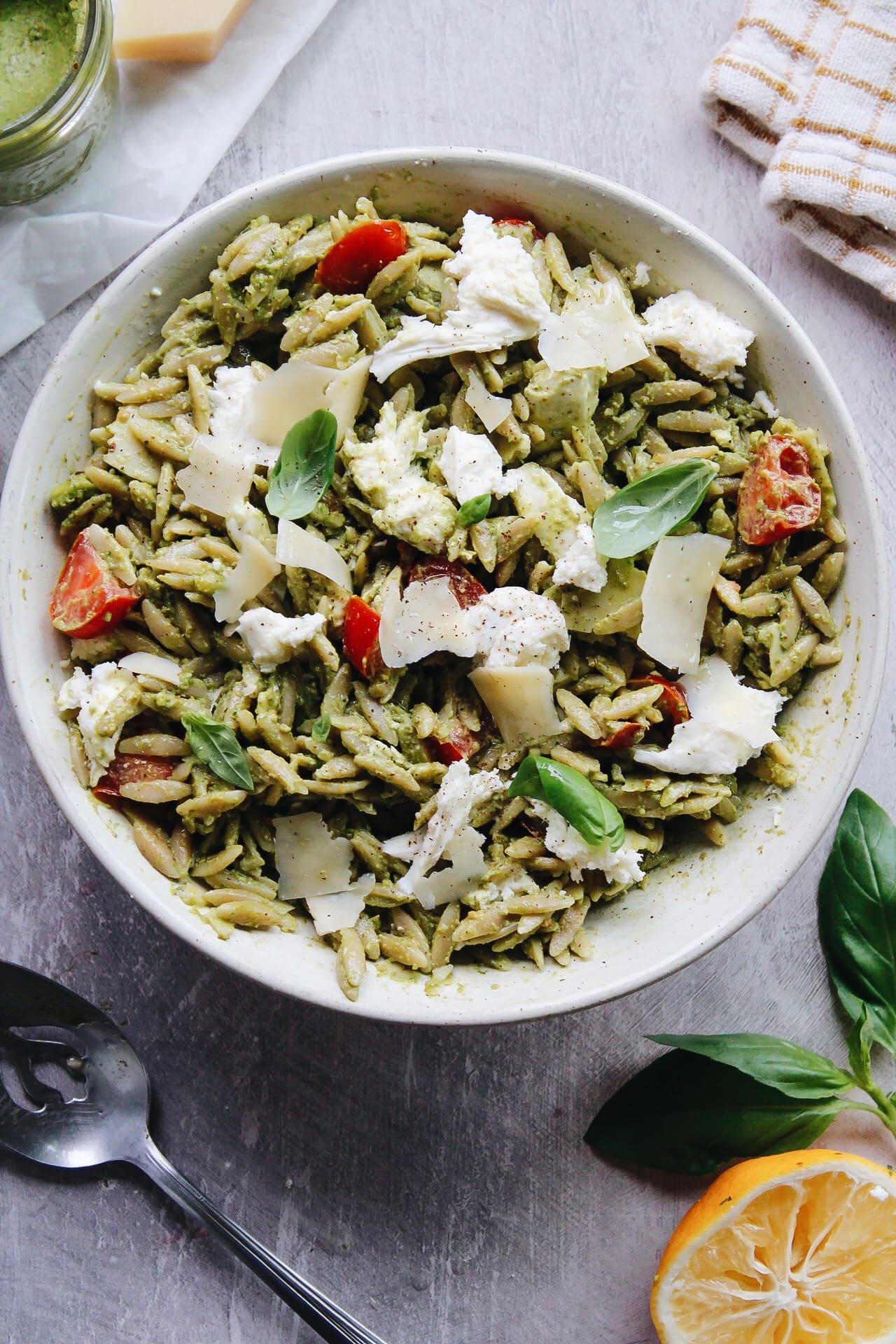 pesto orzo pasta in a white bowl