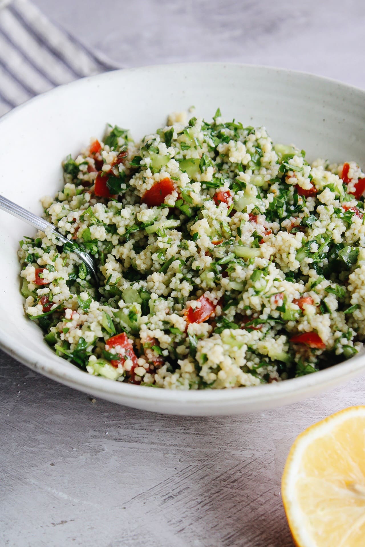 couscous tabbouleh in a white bowl