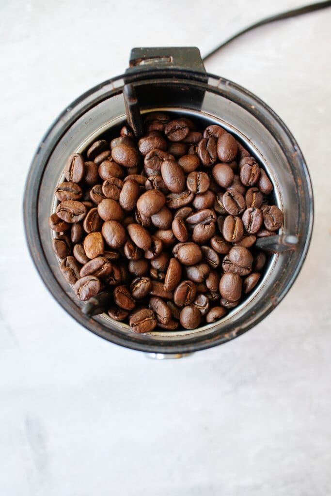 whole bean coffee in grinder