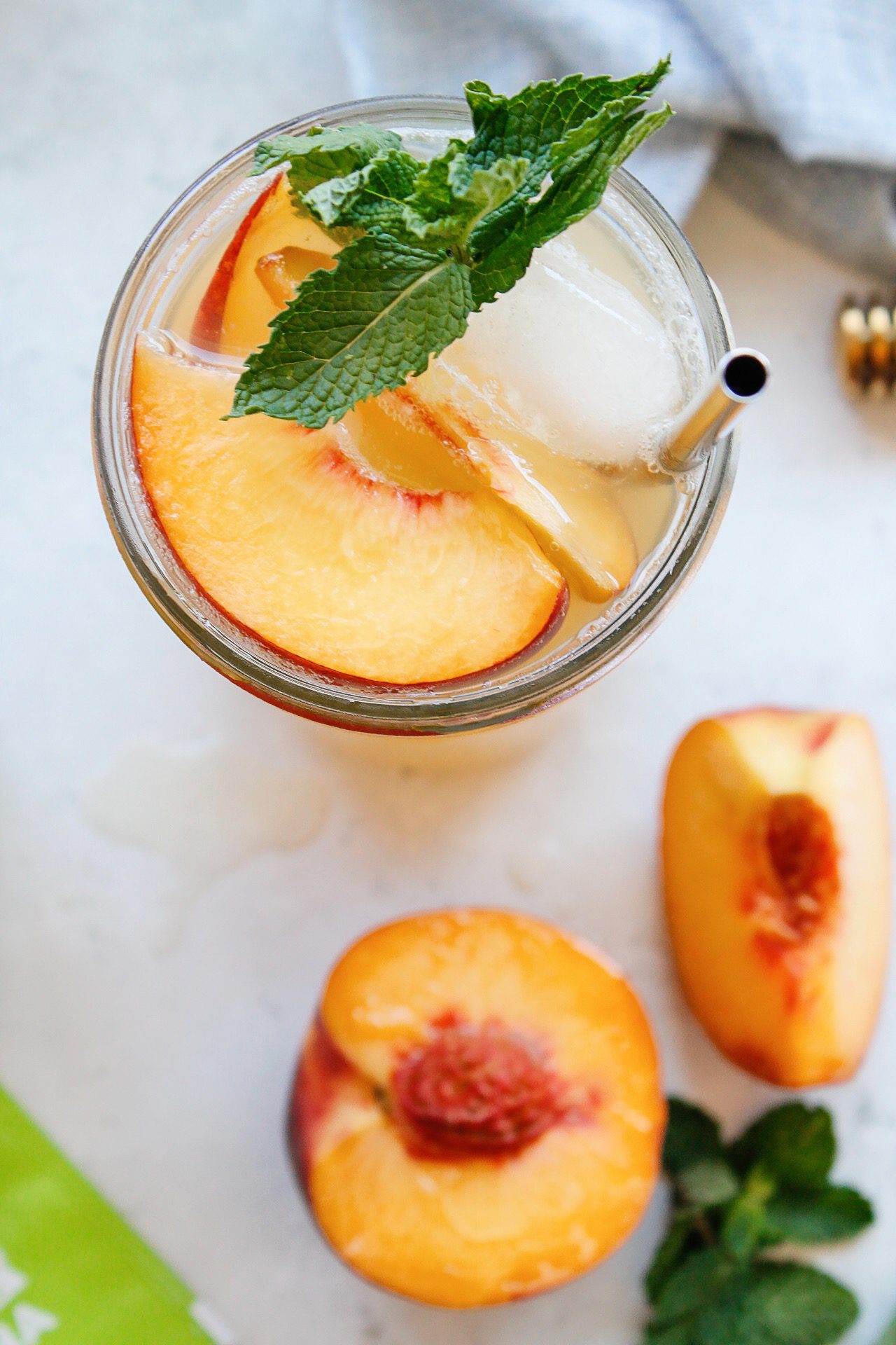 iced peach green tea in a clear glass