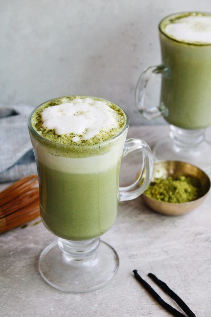 vanilla matcha latte in a clear glass