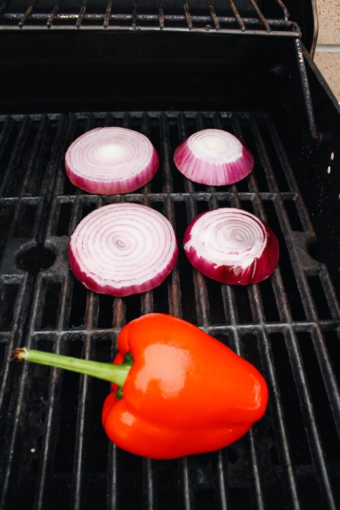 red onion and bell pepper on the grill