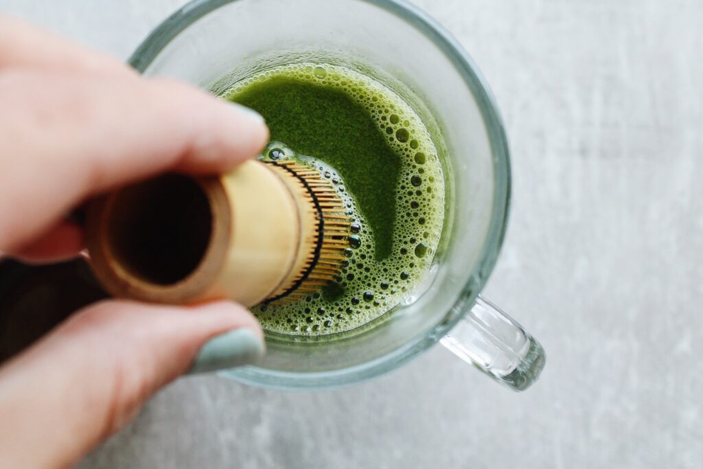 matcha being whisked into hot water