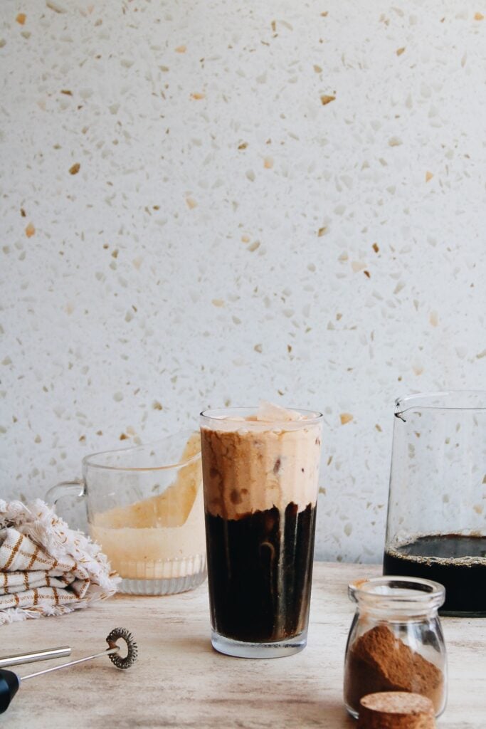 iced coffee with pumpkin cold foam on top