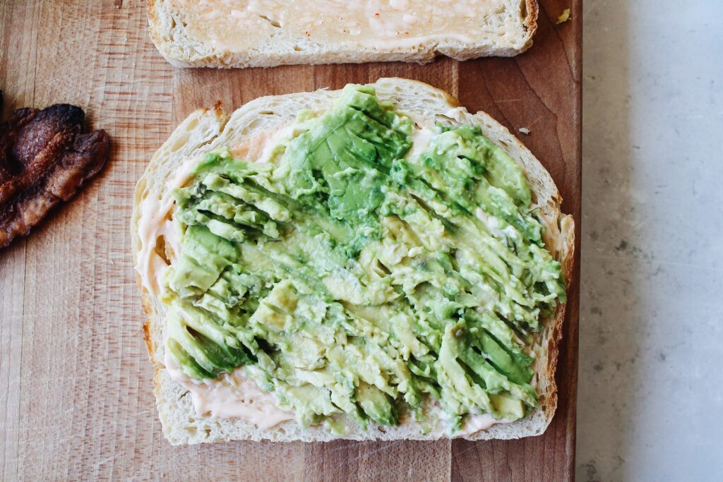 Smashed avocado on sourdough bread with mayo