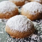 Chai shortbread snowball cookies with powdered sugar dusted on top