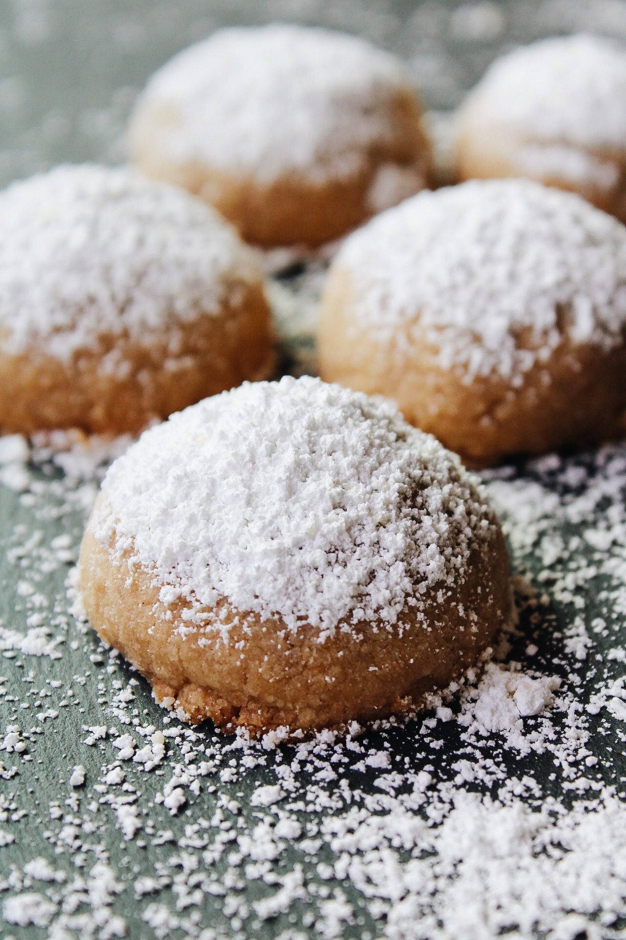 Chai shortbread snowball cookies with powdered sugar dusted on top