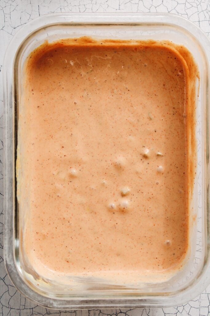 Homemade burger sauce in clear glass container