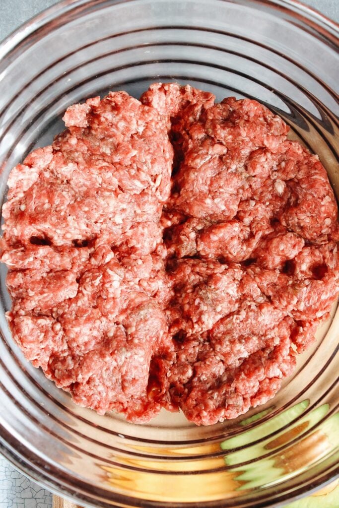 Ground beef for California burgers divided into sections