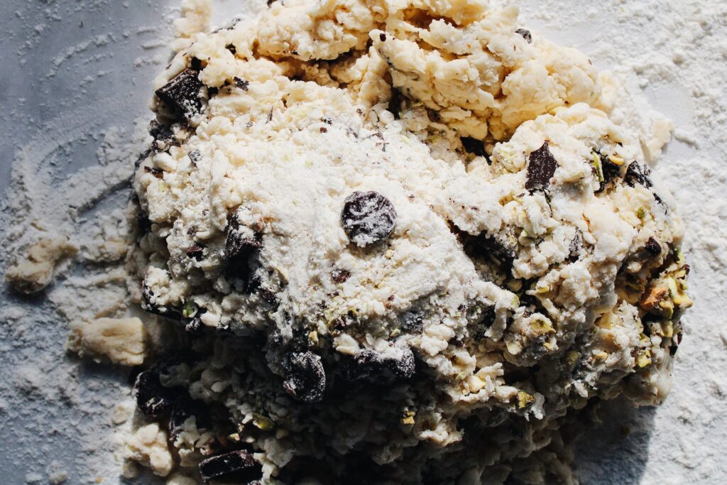 cherry scone dough mixed before being turned out onto a floured surface