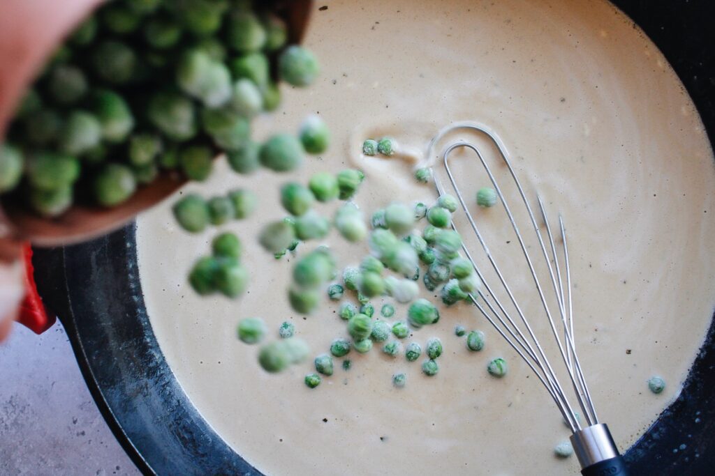 peas being added to boursin