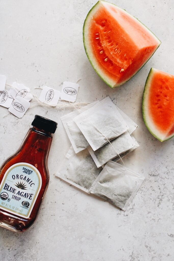 ingredients for watermelon green tea on a marble background