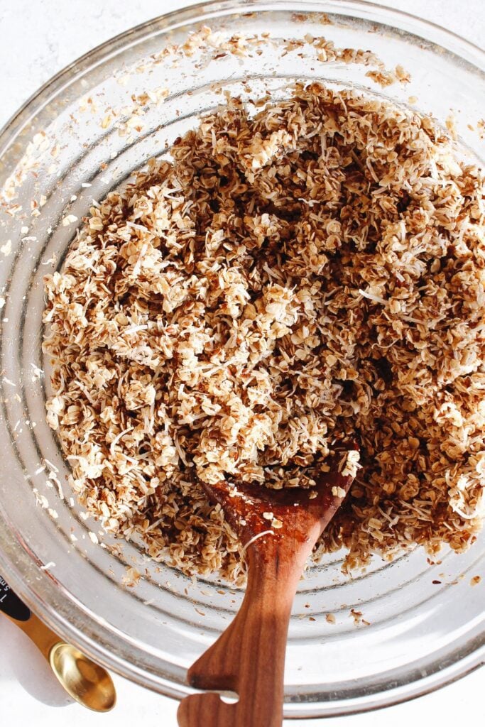 granola mixture fully mixed in a large bowl