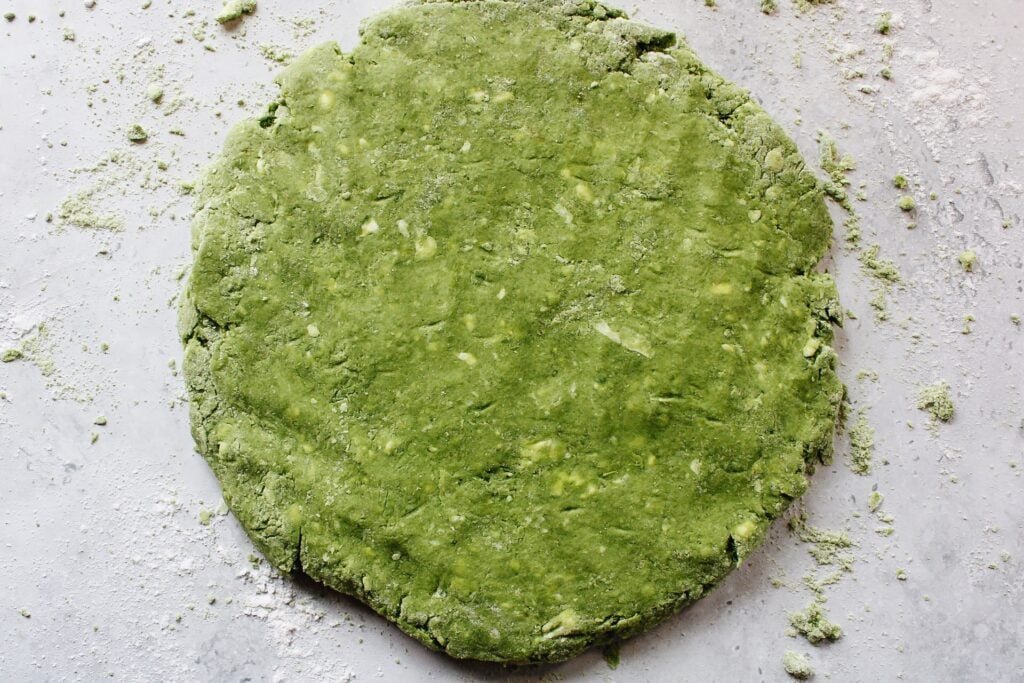 matcha scone dough shaped into a flat disc